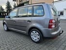 Volkswagen Touran 1,4Turbo Benz. LIFT.Automat.Klimatr 2 str.Tempomat.Hak.ParktroniC - 14