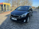 Kia Carens - 4