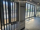 Lokal usługowy na parterze z dużymi witrynami - 9