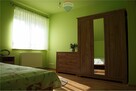 Dom z dwoma mieszkaniami i ogrodem zimowym - 11