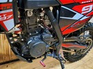 ASIX Inny XT 97 ASIX XT-97 CROSS kros o pojemności 300 z 26 konnym silnikiem HIT - 16