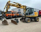 Koparka kolowa kolejowa New Holland MH Plus 2 drogowa - 11
