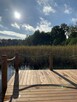 Dom Warmiński z linią brzegową jeziora i pomostem - 12