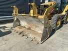 Koparko ladowarka Caterpillar - 11
