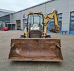 Koparko ladowarka Caterpillar - 7