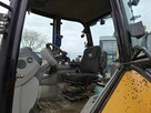 Koparko ladowarka Caterpillar - 16