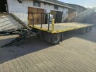 Przyczepa niskopodwoziowa 24tDMC z najazdami i burtami