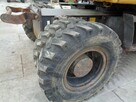 KOPARKA KOLOWA New Holland MH 4.6 - 10