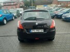 Suzuki Swift 1.3i 4X4 alufelgi klima stan BDB - 6