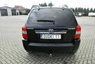 Hyundai Tucson 2,0benz LIFT DUDKI11 Tempomat.Klimatr 2 str.Serwis.El.szyby.Centralka. - 9