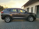 Hyundai Tucson 1.6 benzyna*bezwypadkowy*kamera cofania*nawigacja*grzana kiera i fotel - 4