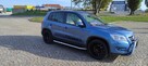 Volkswagen Tiguan z 2010 r. 2.0 TSI 4 Motion o mocy 170 KM b - 4