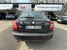 Škoda Octavia Klimatyzacja, Ele szyby 4x, Ele lusterka, Podłokietnik - 7