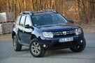 Dacia Duster 1.6 16V (105KM)+Gaz Lift Klima Relingi Grzane fotele Hak ASO  Niemiec - 8