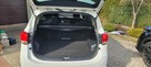 Kia Carens - 10