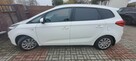Kia Carens - 4