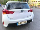 Sprzedam Toyotę Auris Hybrid 1.8 Premium 2014 - 10