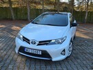Toyota Auris 1.8 Benzyna Hybryda 136km Automat Biała Perła - 3