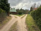 Syndyk sprzeda udział 6/324 w działkach zalesionych i drodze - 6