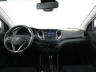 Hyundai Tucson automat 4x4 navi klima auto grzane fotele kamera i czujniki parkowania - 15