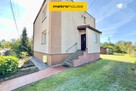 Wolnostojący dom z  garażem i letnią kuchnią.