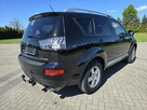 Mitsubishi Outlander 2,4Benz Serwis-Full.Alcantara.Klimatyzacja.El.szyby.Centralka.Hak - 9