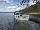 Czarter jacht motorowy wynajem łodzi Mazury bez patentu - 1
