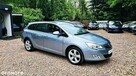 Opel Astra IV 1.4 T Cosmo - 10