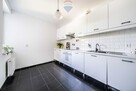 Wygodne mieszkanie w apartamentowcu - 11