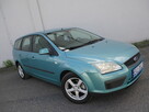 FORD FOCUS 1.6 benzyna KOMBI alufelgi REJ.PL Klima DO JAZDY - 1