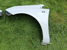 Blotnik przod opel corsa d kod lak Z474. - 3