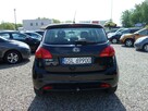 KIA VENGA - 3