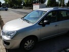 Kia Carens - 4