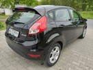 Ford Fiesta Bardzo dynamiczny  i ekonomiczny 4,5l./100km.  Polecam - 7