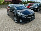 Kia Carens - 2