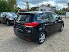 Kia Carens - 7