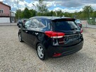 Kia Carens - 10