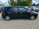 Kia Carens - 12