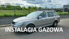 Škoda Octavia 1.6 MPI + LPG Manual 2013r. Klimatyzacja Alufelgi Isofix Kombi Ładna - 1