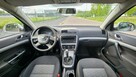 Škoda Octavia 1.6 MPI + LPG Manual 2013r. Klimatyzacja Alufelgi Isofix Kombi Ładna - 8