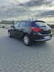 Ładny Opel Astra niski przebieg - 8
