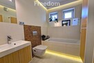 Urokliwy dom z świetnie zagospodarowaną działką - 12