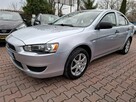 Mitsubishi Lancer Zarejestrowany i Ubezpieczony. Oryginalny Przebieg. Serwisowany. - 4