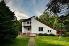 Bartołty Wielkie, dom przy ścianie lasu, jezioro - 1