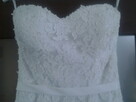 Biała suknia ślubna z podpinanym trenem - 8