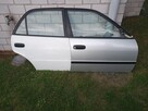 Prawe drzwi i błotnik do Toyoty Corolli E 11 - 3