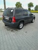 Mazda Tribute - 2