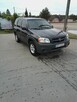 Mazda Tribute - 3