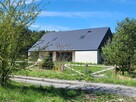 Dom w trakcie budowy nad jeziorem przy lesie - 12