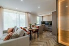 Na sprzedaż dwupoziomowy apartament z ogródkiem - 2